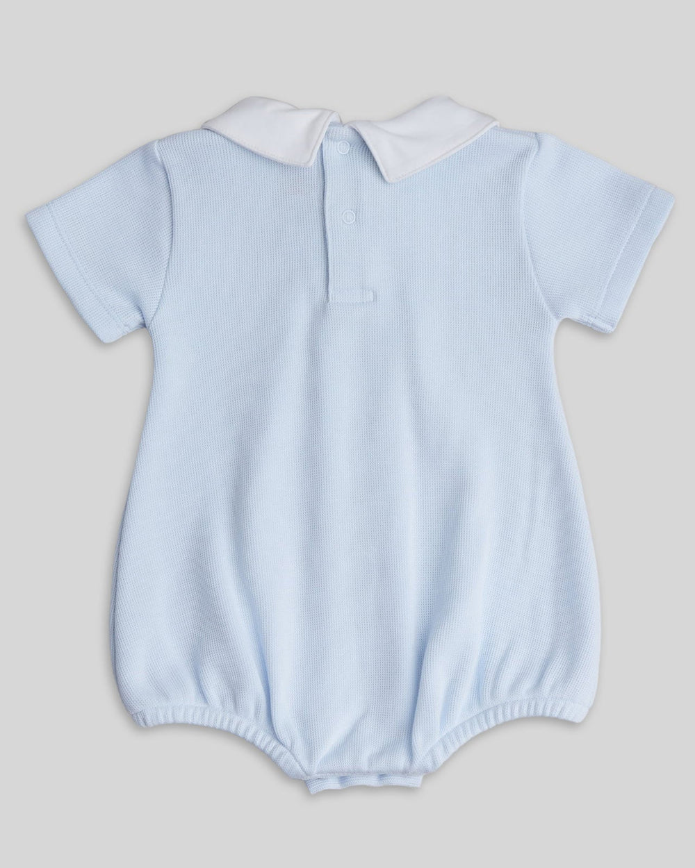 Romper celeste para bebê varon, desenho comodo e elegante ideal para cualquier ocasion
