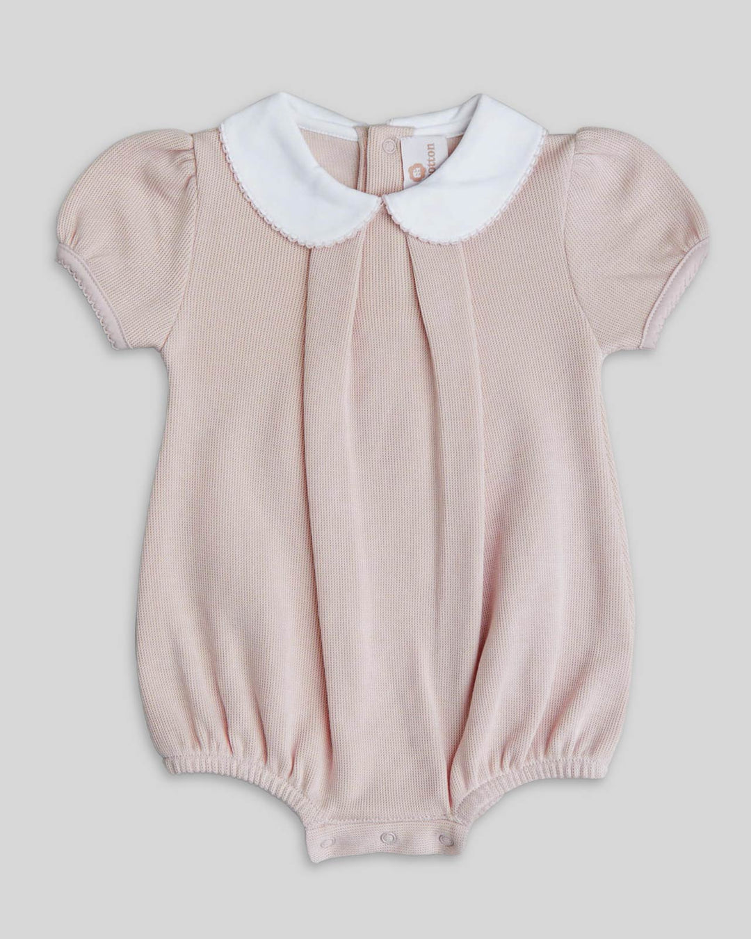 Romper na cor nude para bebê menina, desenho delicado e comodo com acabados de alta calidad