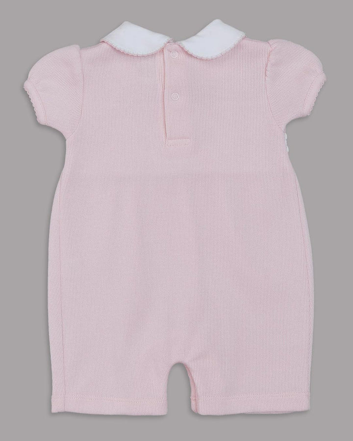 Macacão curto Dina para bebês na cor rosa com bordado smocking inglês 